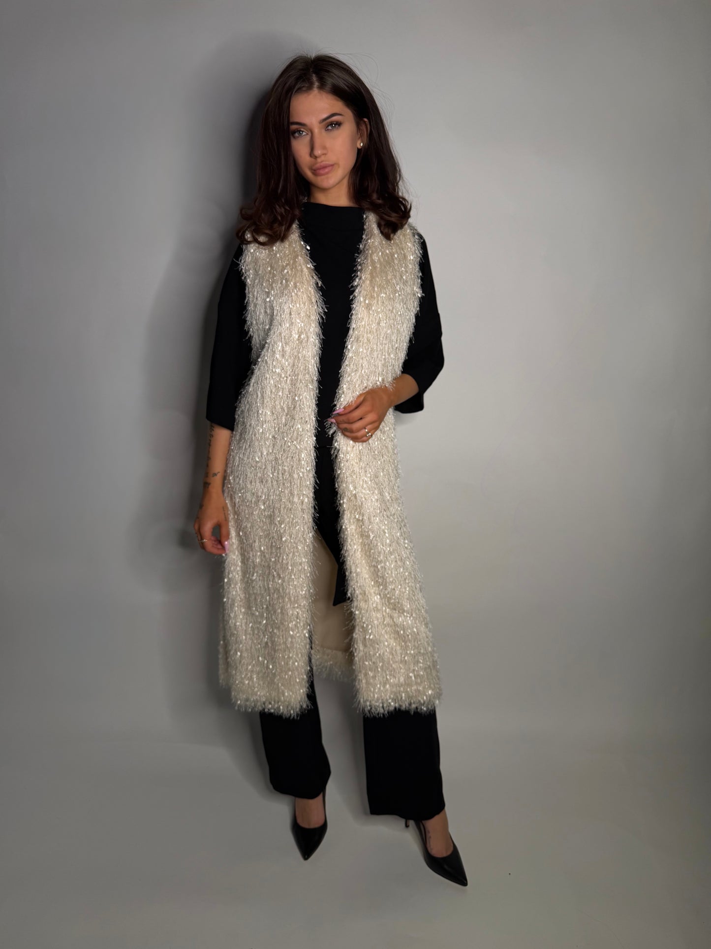 Elegant textured long vest.