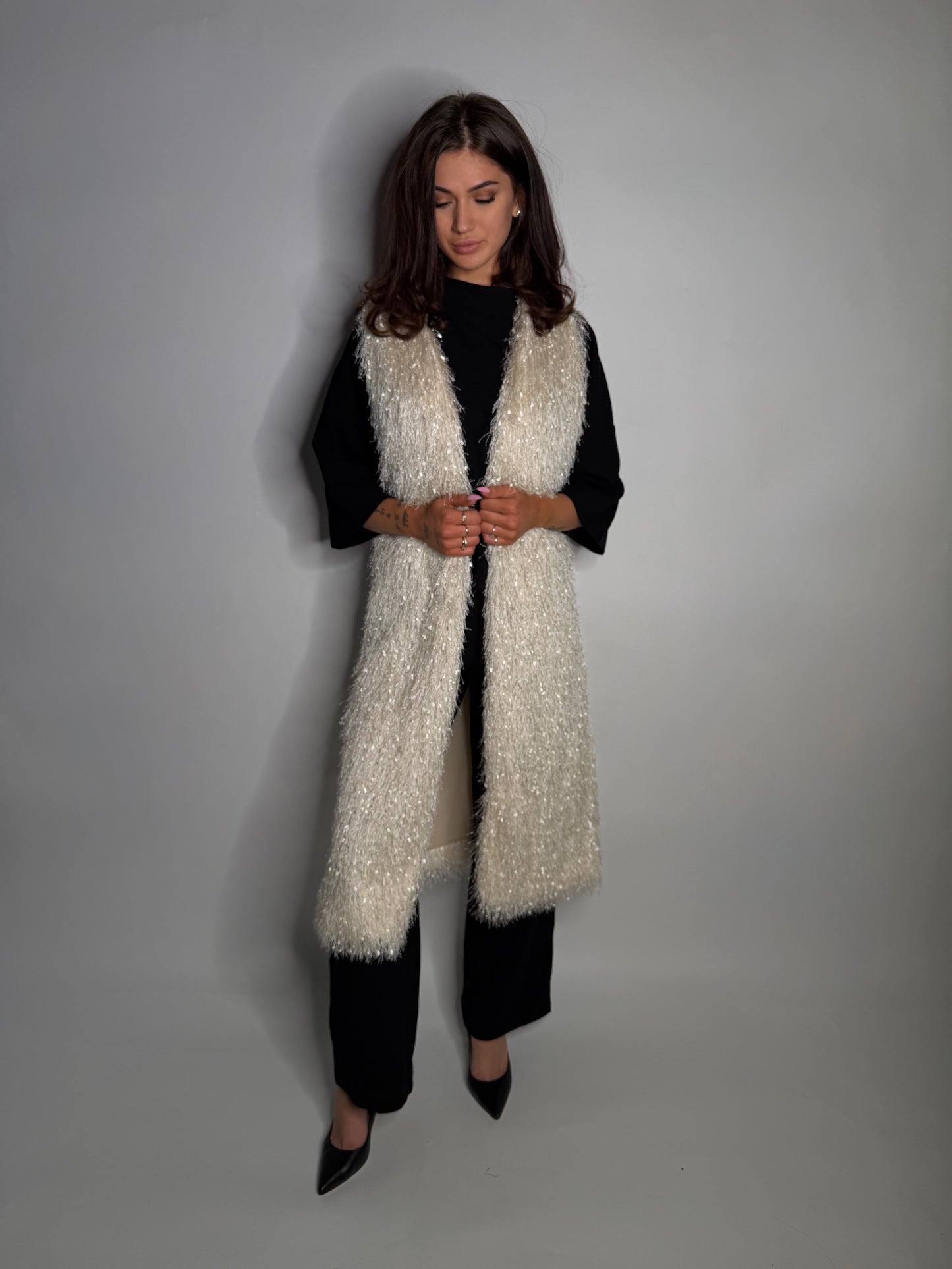 Elegant textured long vest.